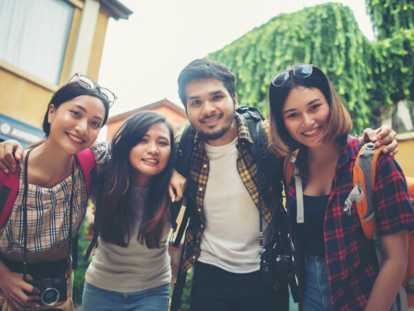 Group of friends meeting in the city. Having fun together talking selfie smiling enjoy good times together.